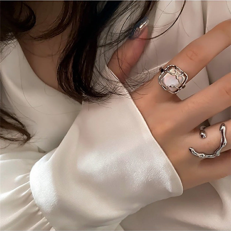 Irregular metal pearl opening rings